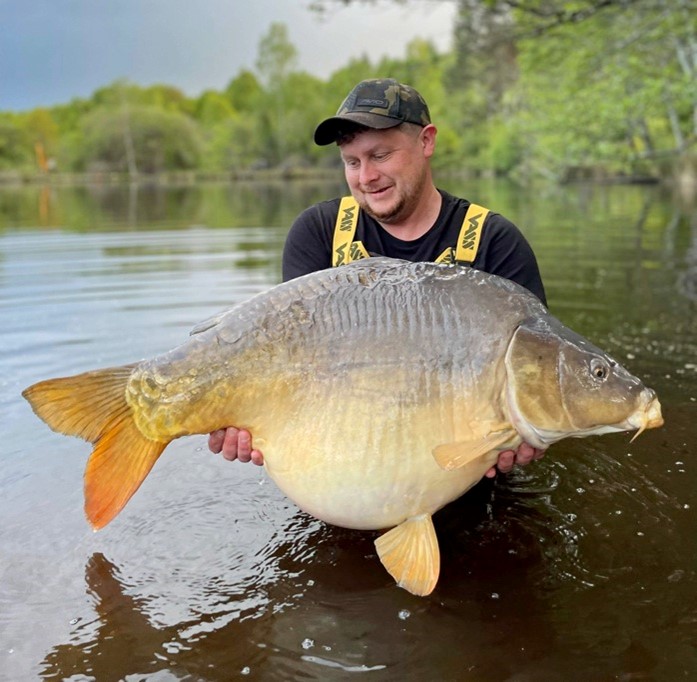 Man holding large fish